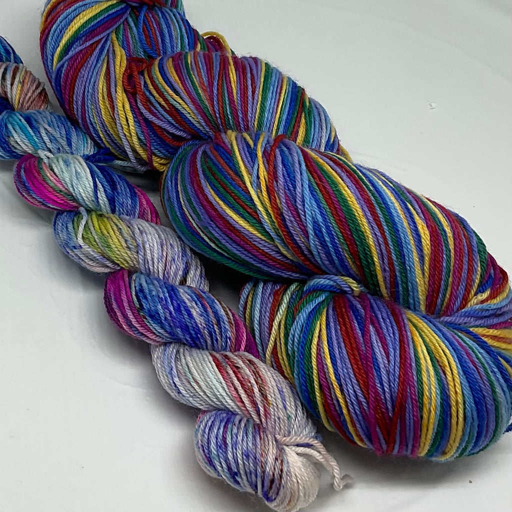 I’m Speaking Eight Stripe Self Striping Yarn with Speckled Mini Skein