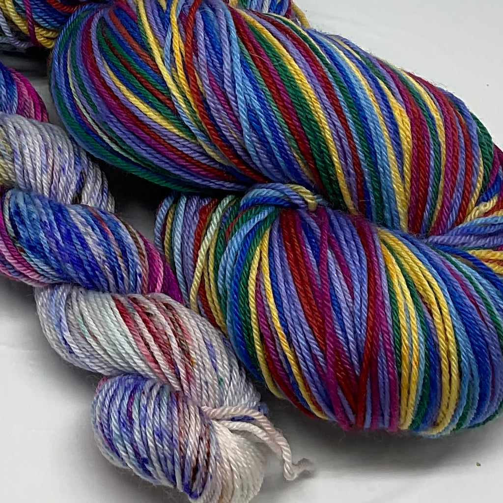 I’m Speaking Eight Stripe Self Striping Yarn with Speckled Mini Skein