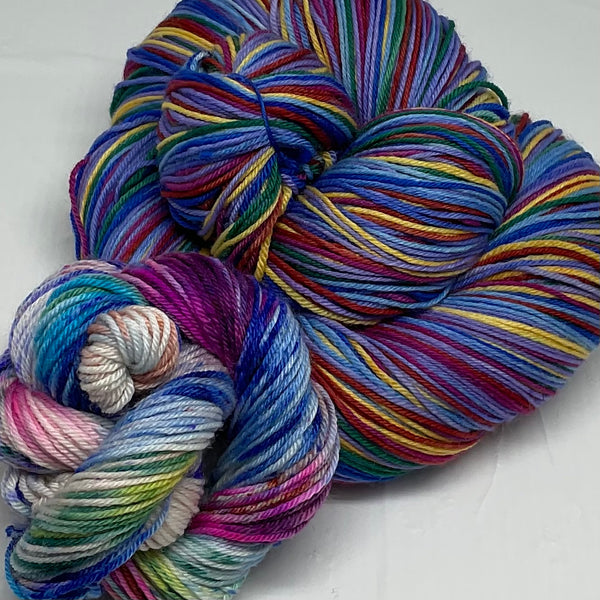 I’m Speaking Eight Stripe Self Striping Yarn with Speckled Mini Skein