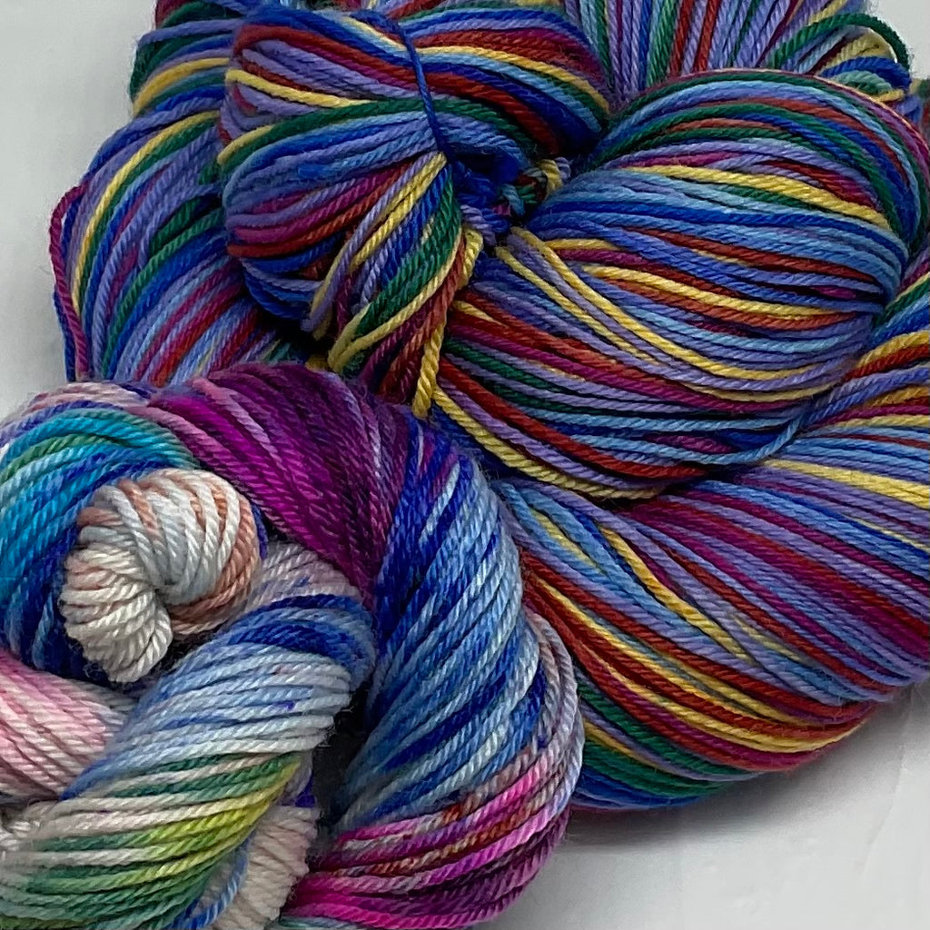 I’m Speaking Eight Stripe Self Striping Yarn with Speckled Mini Skein