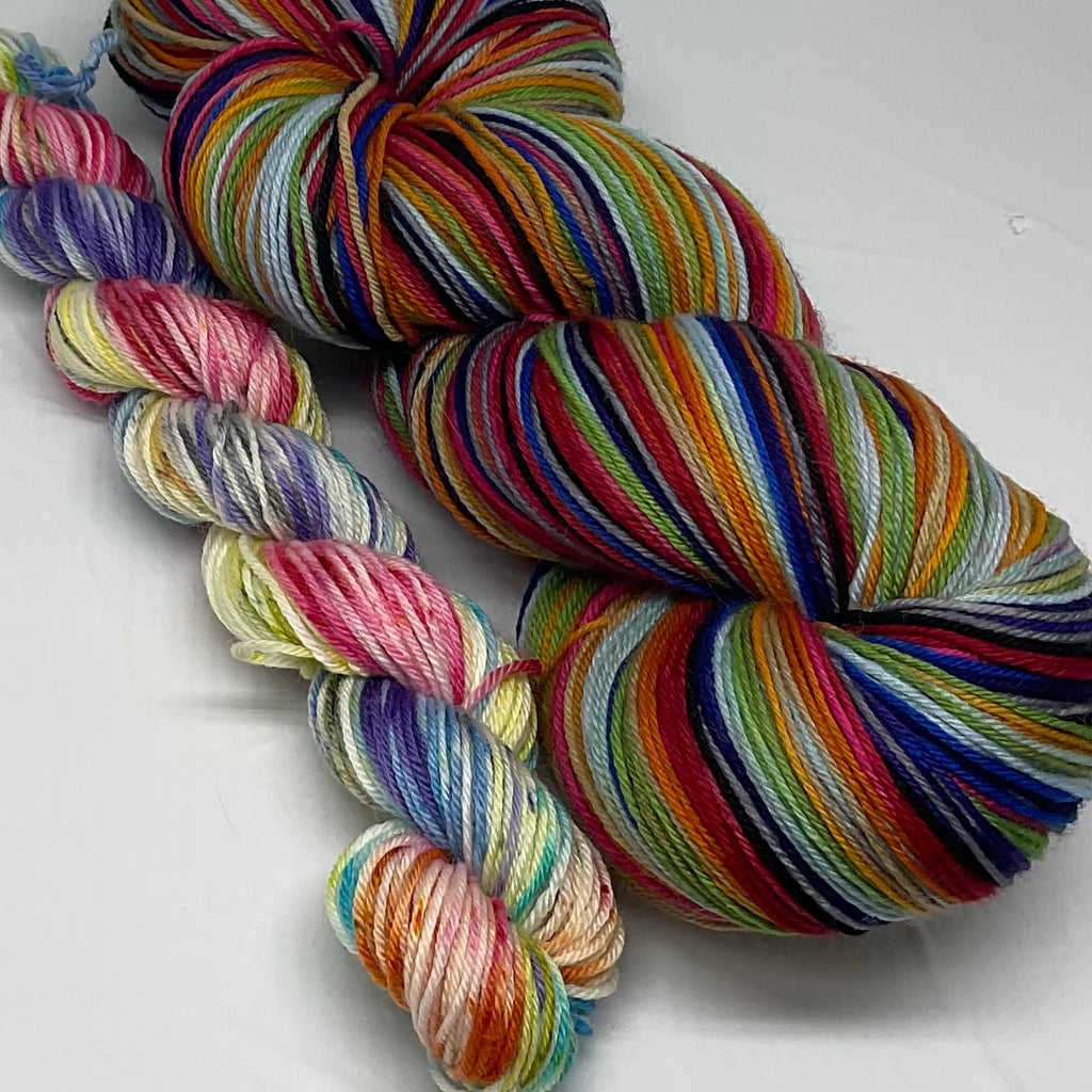 Rainbow Pantsuits Twelve Stripe Self Striping Yarn with Coordinating Speckled Mini Skein