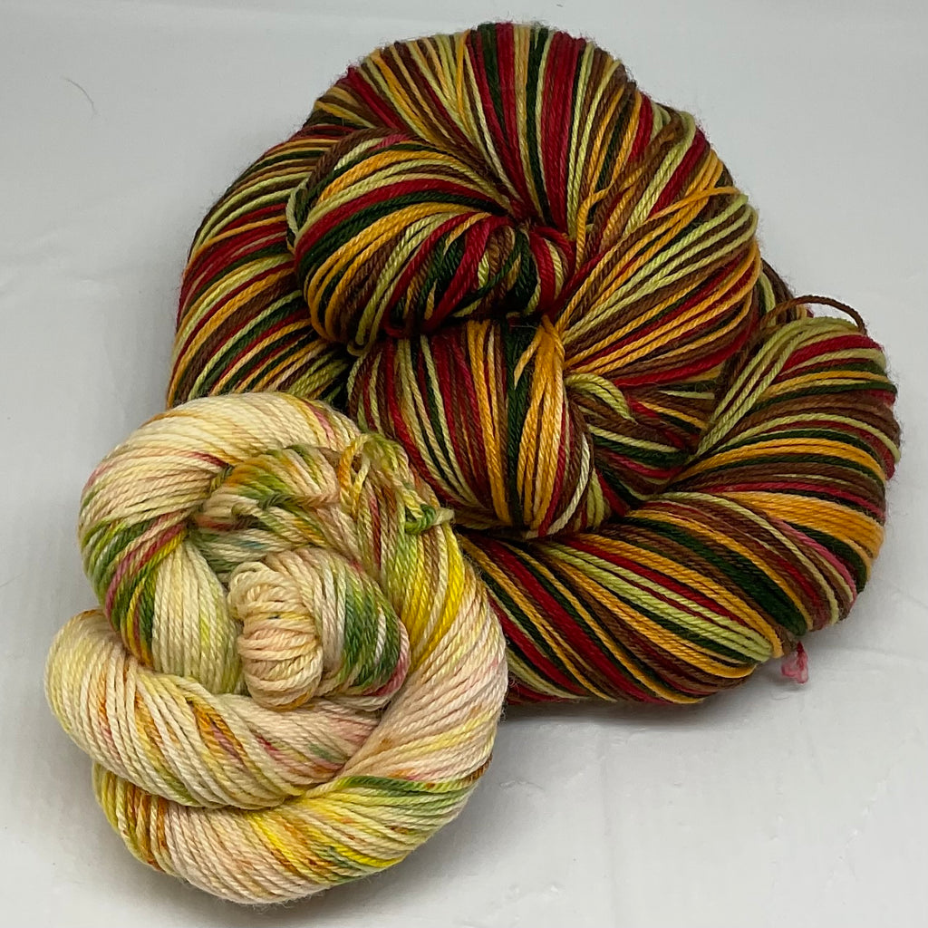 Holiday Mulled Wine Five Stripe Self Striping Yarn with Coordinating Speckled Mini Skein