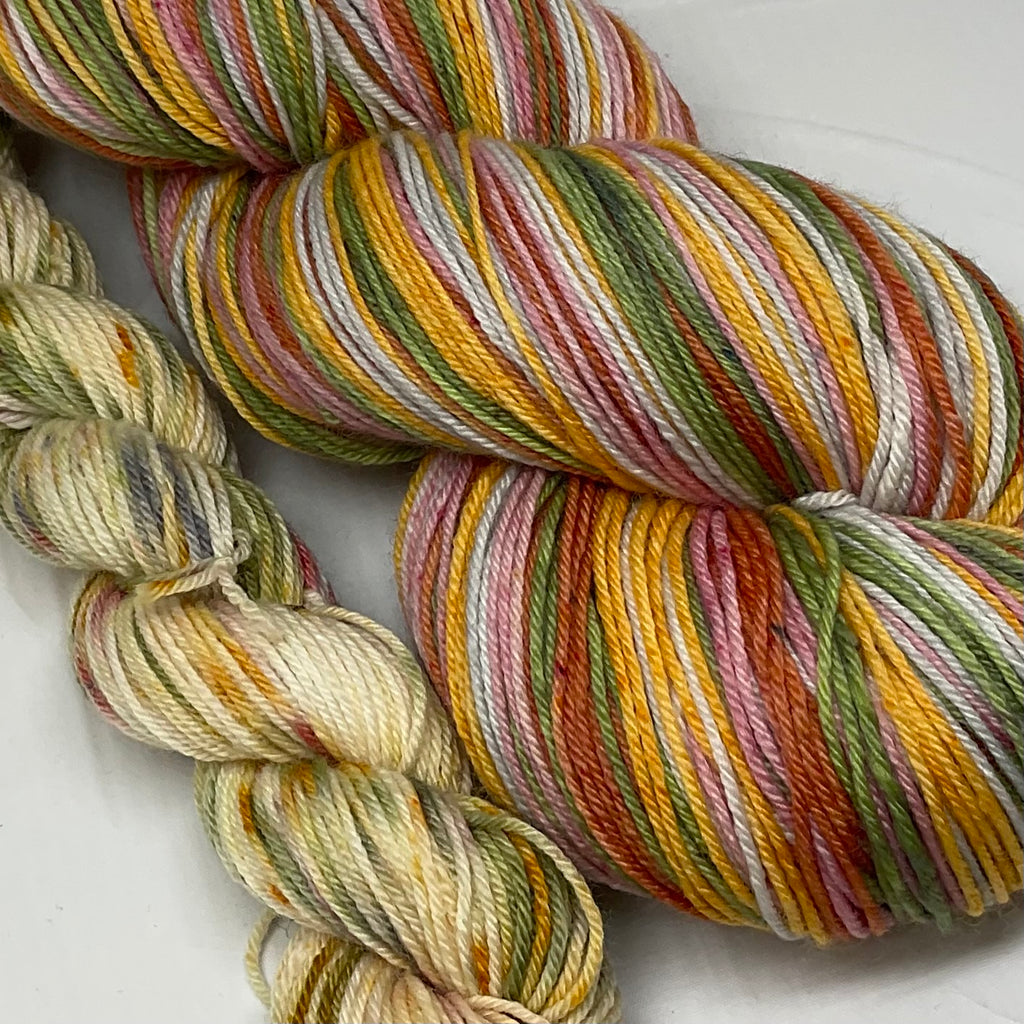 Holiday Elegance Five Stripe Self Striping Yarn with Coordinating Speckled Mini Skein