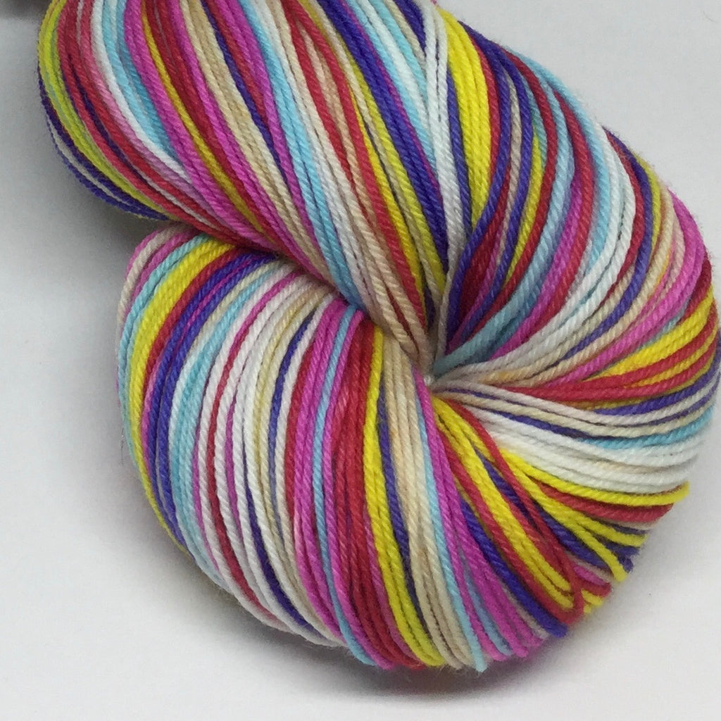 HBD, Charles Shultz Seven Stripe Self Striping Yarn with a 100 yd Mini Skein