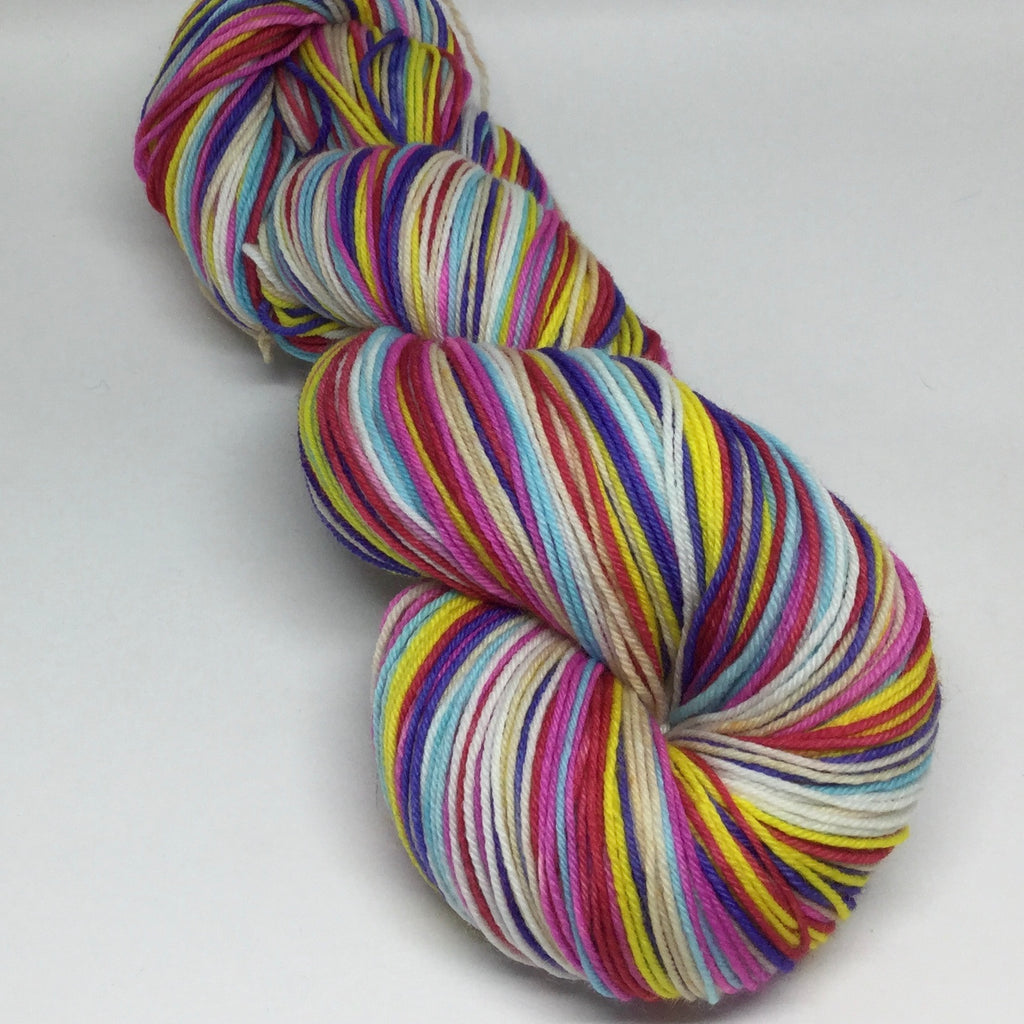 HBD, Charles Shultz Seven Stripe Self Striping Yarn with a 100 yd Mini Skein